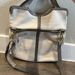 Cream leather Fossil handbag with gold hardware.